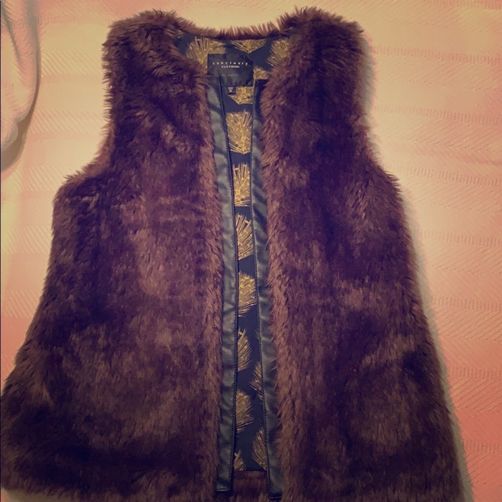 Faux fur vest with inside pockets